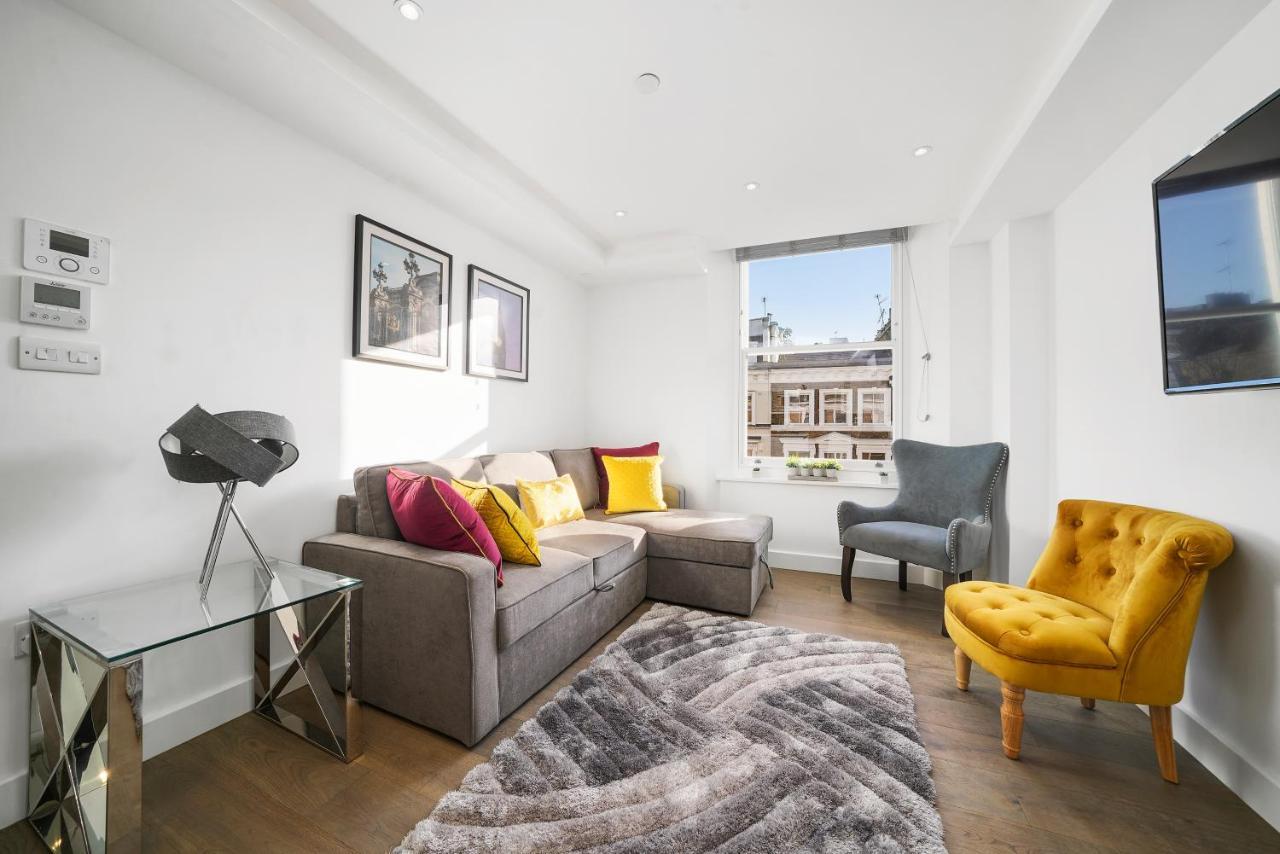 City Prime Apartments ロンドン エクステリア 写真 A living room in a serviced apartment in London
