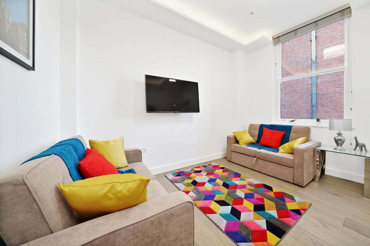 City Prime Apartments ロンドン エクステリア 写真 A living room in a serviced apartment in London